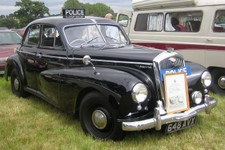 1280px-Wolseley_6_80_Police_car_per_the_British_movies_of_the_day.jpg